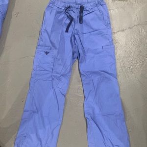 Ceil blue scrub pants, fair condition, back upper pocket tag discolored